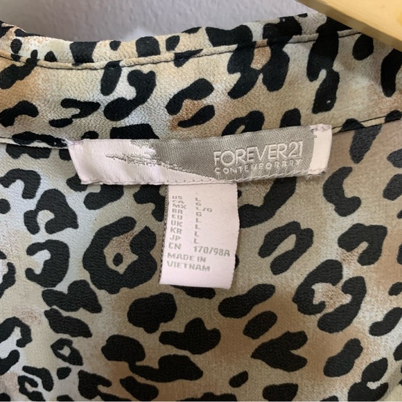 Forever 21 long sleeve leopard printed button up blouse. - Picture 2 of 4